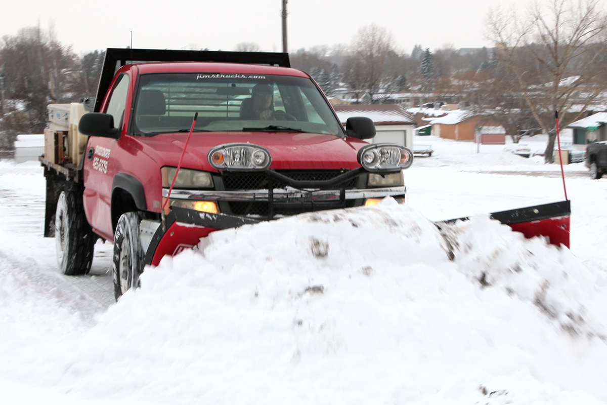Pushing and clearing snow with a pickup